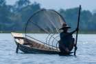 Inlay Lake-Shan State-Myanmar-Fisherman poles his canoe Art Print